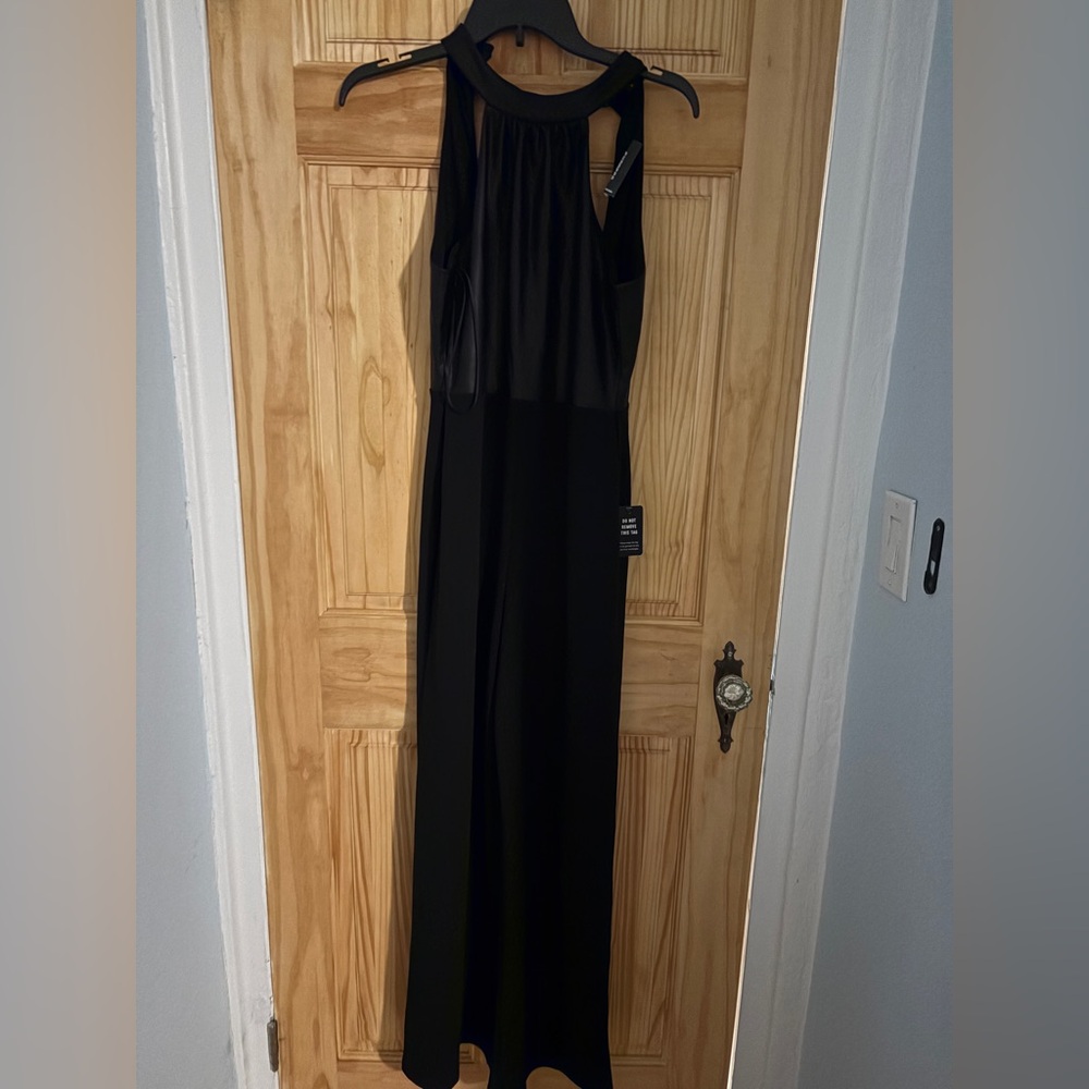NWT Express Vegan Leather Jumpsuit
Size Small
